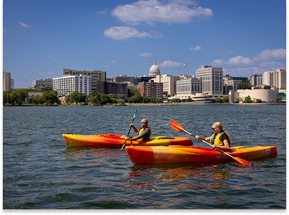 two people kayaking in Madison's lake